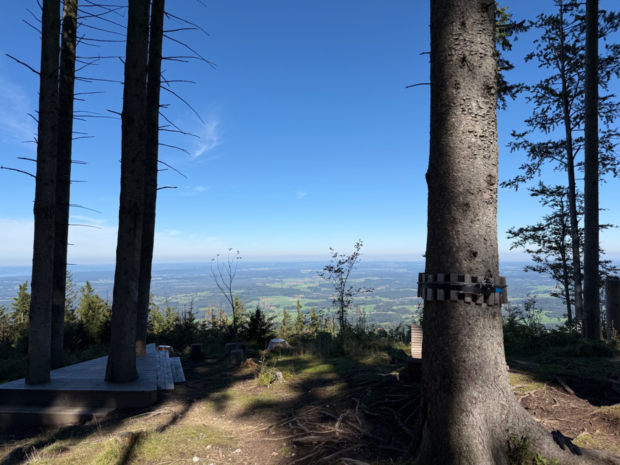 Mountain viewpoint looking over fields and landscape